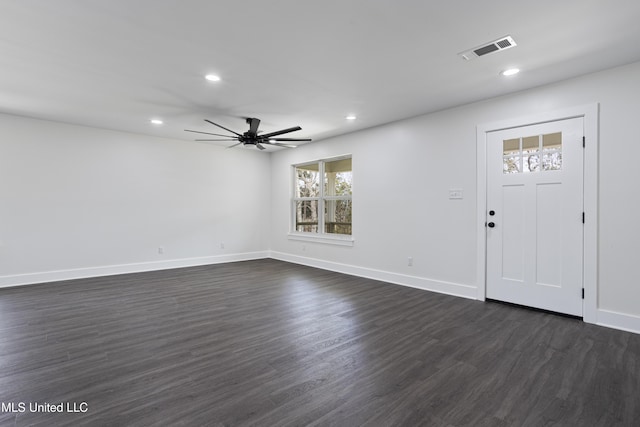 entrance foyer featuring dark wood-style floors, visible vents, recessed lighting, and baseboards