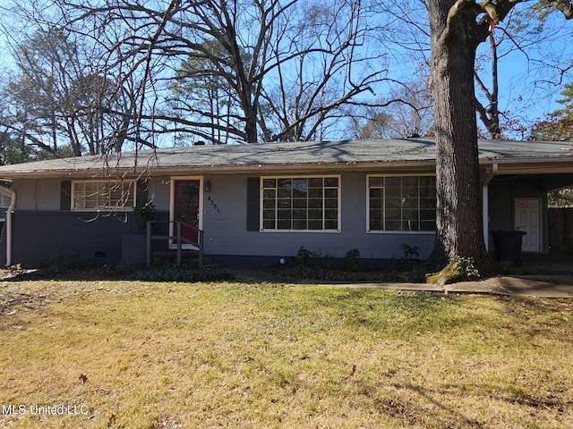 ranch-style home with a front yard