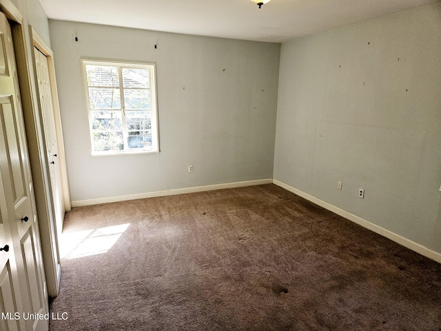 empty room featuring carpet