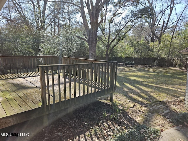 deck featuring a yard