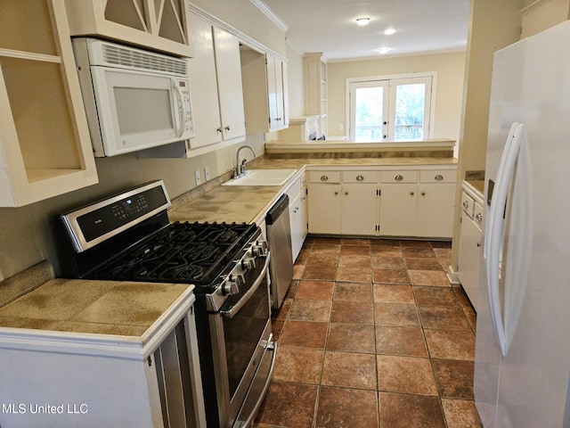 kitchen featuring white cabinetry, sink, ornamental molding, and appliances with stainless steel finishes