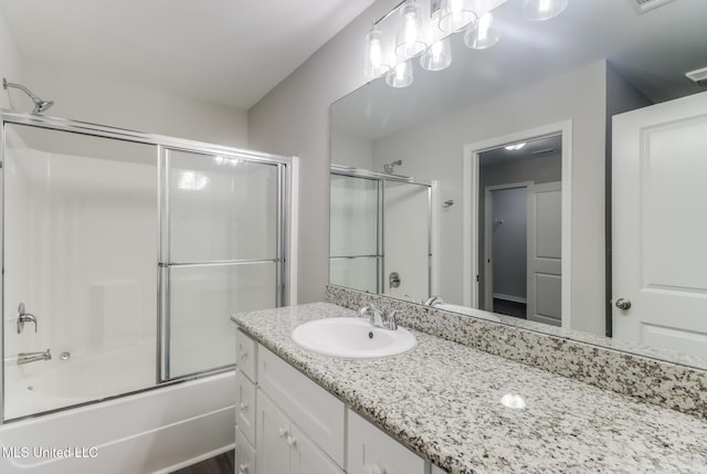 13262 Turtle Creek Pkwy, Gulfport, MS 39503 - full bathroom featuring vanity and bath / shower combo with glass door