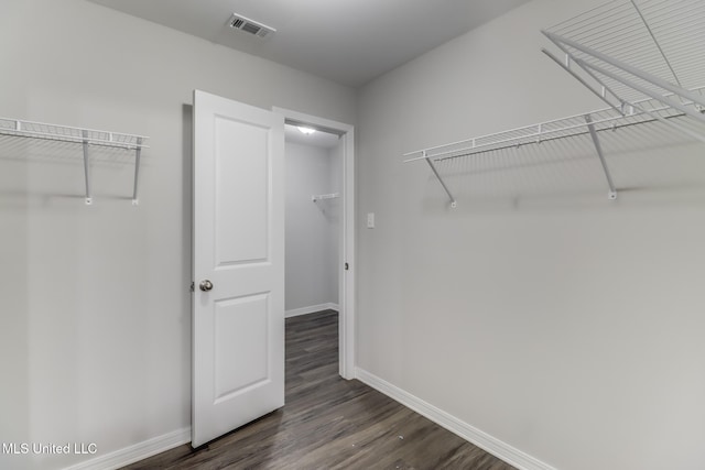 13262 Turtle Creek Pkwy, Gulfport, MS 39503 - walk in closet featuring dark wood-type flooring