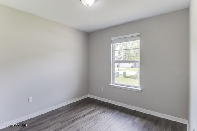 13262 Turtle Creek Pkwy, Gulfport, MS 39503 - spare room with dark wood-type flooring and baseboards