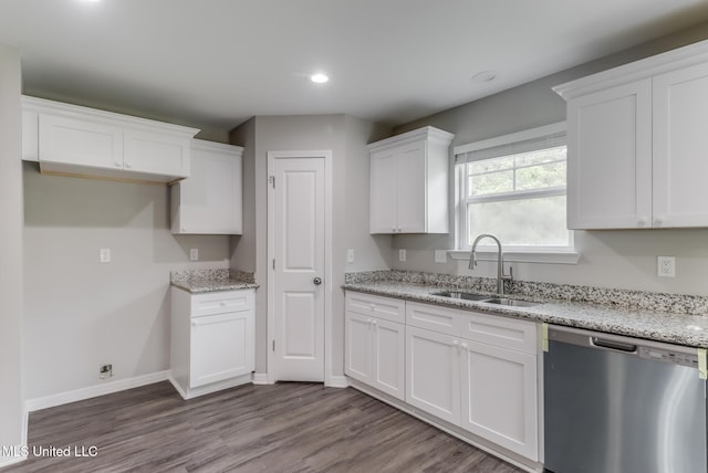13262 Turtle Creek Pkwy, Gulfport, MS 39503 - kitchen featuring dishwasher, a sink, white cabinetry, dark wood-style flooring, and light stone countertops