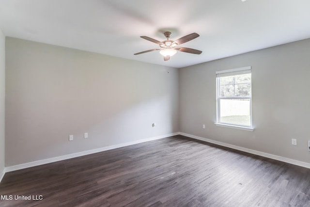 13262 Turtle Creek Pkwy, Gulfport, MS 39503 - empty room featuring dark wood-style flooring, ceiling fan, and baseboards