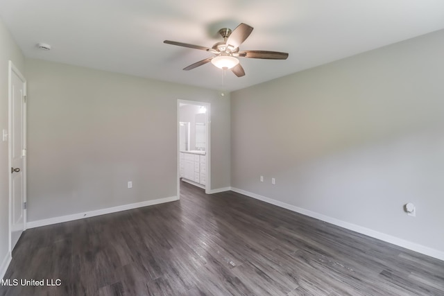 13262 Turtle Creek Pkwy, Gulfport, MS 39503 - spare room with a ceiling fan, baseboards, dark wood finished floors, and a smoke detector