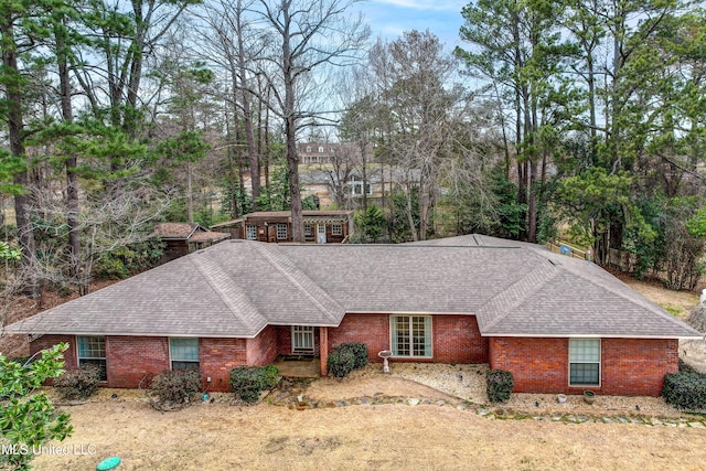 911 Newitt Vick Dr, Vicksburg, MS 39183 - ranch-style house featuring a shingled roof and brick siding