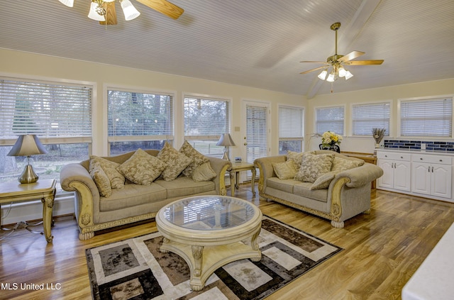 911 Newitt Vick Dr, Vicksburg, MS 39183 - living room featuring a ceiling fan, light wood-style floors, and vaulted ceiling
