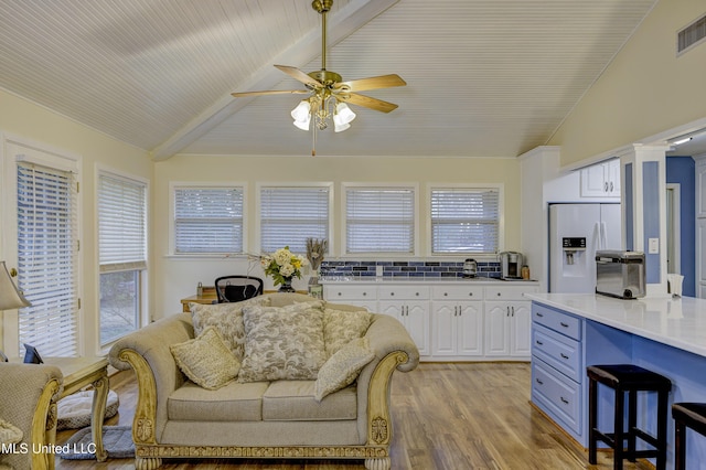911 Newitt Vick Dr, Vicksburg, MS 39183 - living room featuring ceiling fan, plenty of natural light, and light wood-type flooring