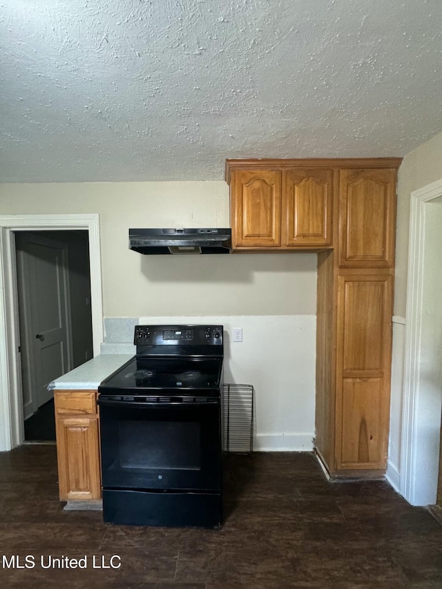 kitchen featuring dark hardwood / wood-style flooring, a textured ceiling, and black range with electric cooktop