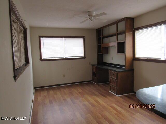 unfurnished bedroom featuring wood finished floors