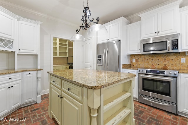 11541 Briarstone Pl, Gulfport, MS 39503 - kitchen featuring stainless steel appliances, brick floors, ornamental molding, tasteful backsplash, and light stone countertops