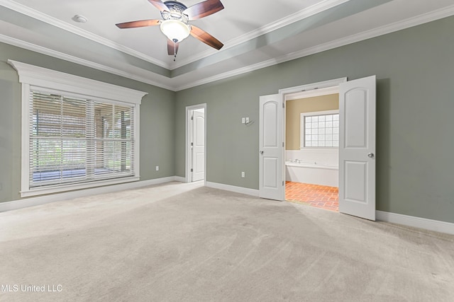11541 Briarstone Pl, Gulfport, MS 39503 - unfurnished bedroom featuring light colored carpet, multiple windows, crown molding, ensuite bathroom, and ceiling fan