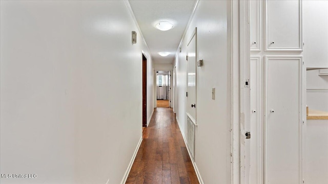 555 Rusk Dr, Brandon, MS 39047 - corridor with dark wood-style floors and baseboards