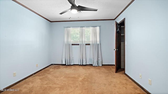 555 Rusk Dr, Brandon, MS 39047 - unfurnished room with ornamental molding, light colored carpet, ceiling fan, and a textured ceiling
