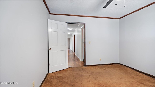 555 Rusk Dr, Brandon, MS 39047 - unfurnished room with ornamental molding, light carpet, and a ceiling fan