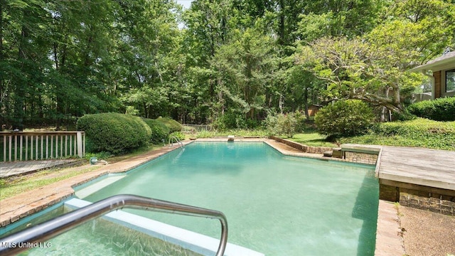 555 Rusk Dr, Brandon, MS 39047 - view of swimming pool featuring a diving board