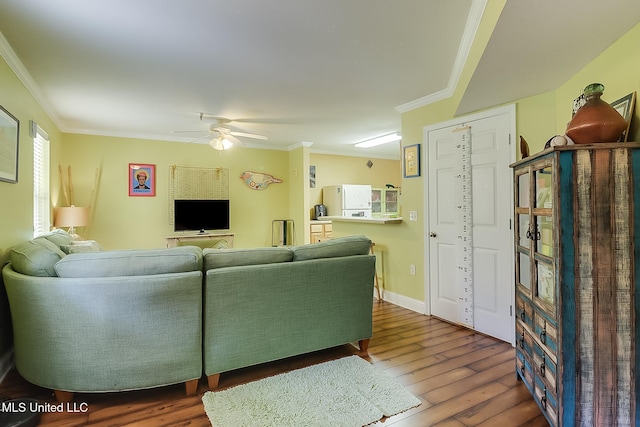 515 Third St Unit 5A, Bay Saint Louis, MS 39520 - living area with crown molding, ceiling fan, and wood finished floors