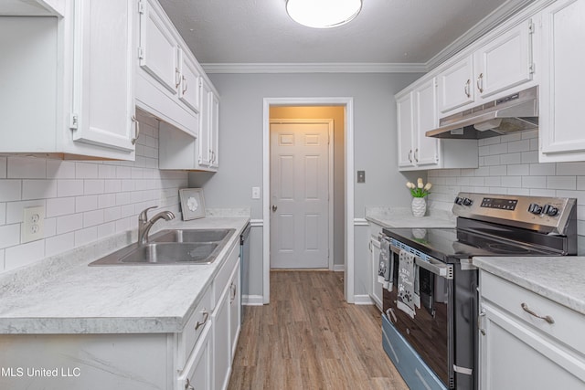 kitchen with sink, white cabinetry, light hardwood / wood-style flooring, ornamental molding, and stainless steel range with electric stovetop