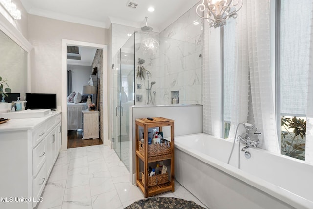 ensuite bathroom with vanity, a shower stall, crown molding, a bath, and marble finish floor