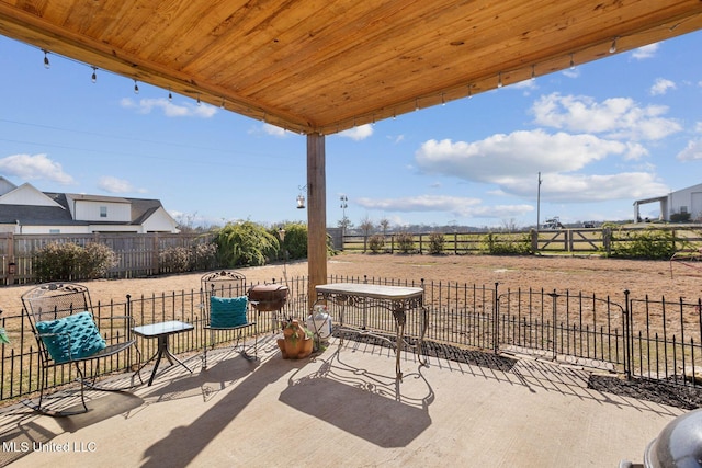 view of patio with fence