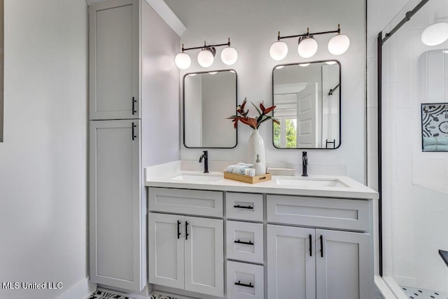 bathroom with a shower with door and vanity