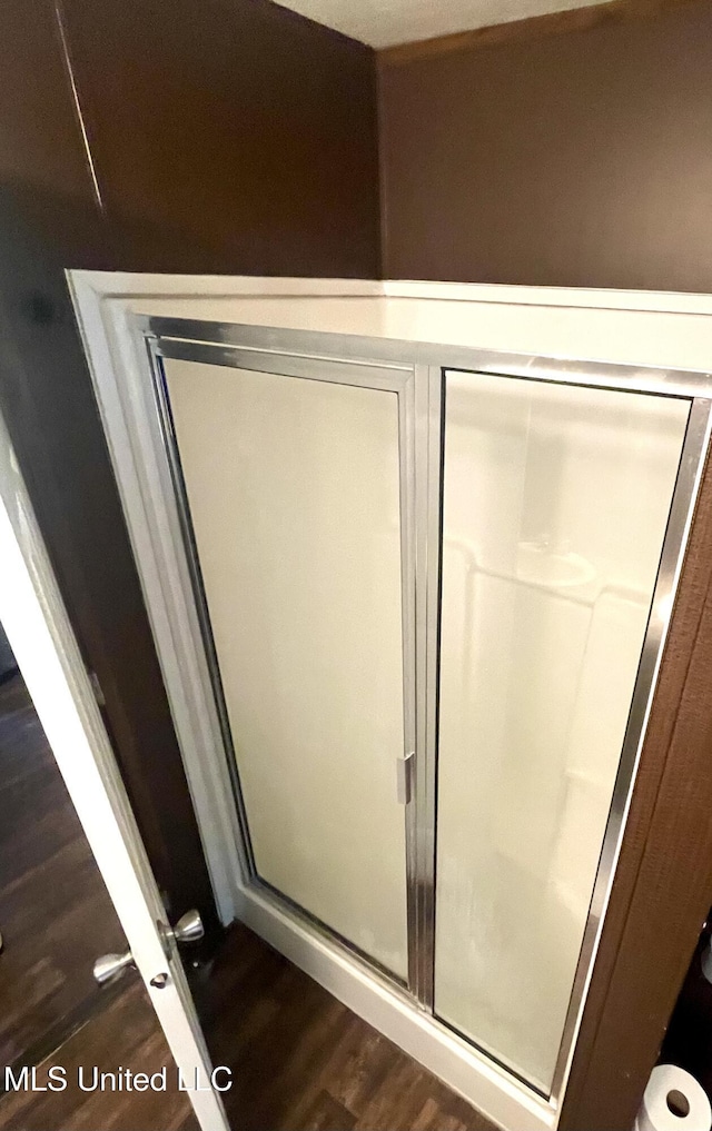43 White Oak Dr, Natchez, MS 39120 - bathroom with wood finished floors and a stall shower