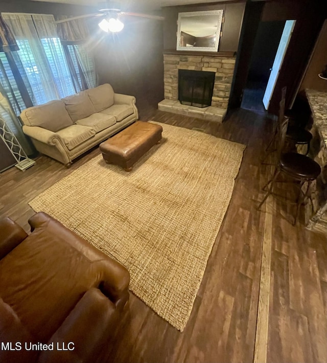 43 White Oak Dr, Natchez, MS 39120 - living room featuring wood finished floors, a fireplace, and a ceiling fan