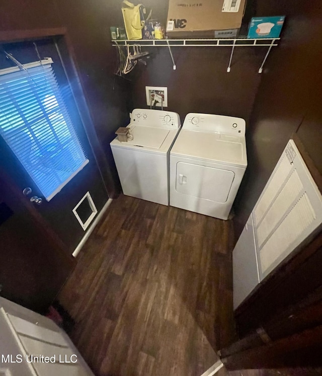 43 White Oak Dr, Natchez, MS 39120 - laundry area featuring washer and dryer and wood finished floors