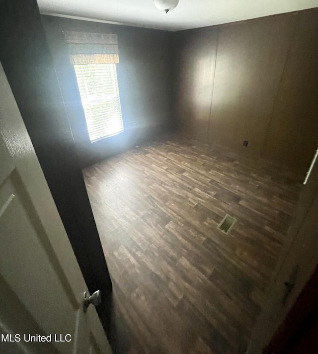 43 White Oak Dr, Natchez, MS 39120 - unfurnished room featuring dark wood-style floors