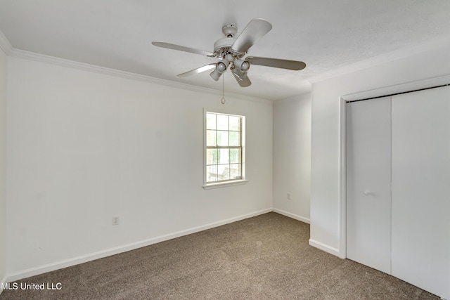354 Lakeway Dr, Brandon, MS 39047 - unfurnished bedroom featuring carpet floors, ornamental molding, a closet, baseboards, and ceiling fan