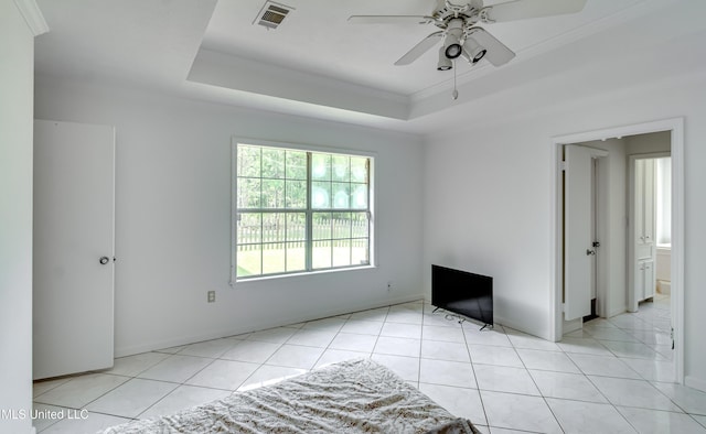 354 Lakeway Dr, Brandon, MS 39047 - tiled spare room featuring ceiling fan, a raised ceiling, and crown molding