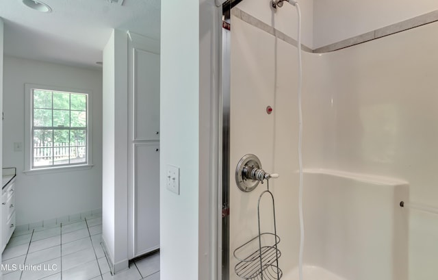 354 Lakeway Dr, Brandon, MS 39047 - full bathroom with a shower, tile patterned flooring, and vanity