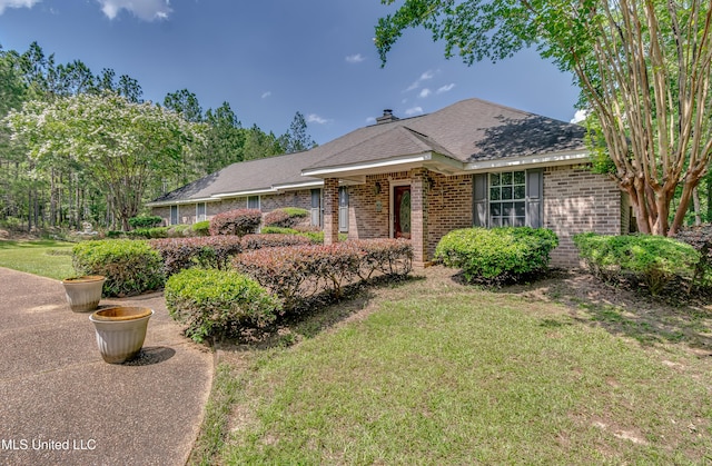 354 Lakeway Dr, Brandon, MS 39047 - ranch-style house featuring brick siding, a front lawn, and roof with shingles