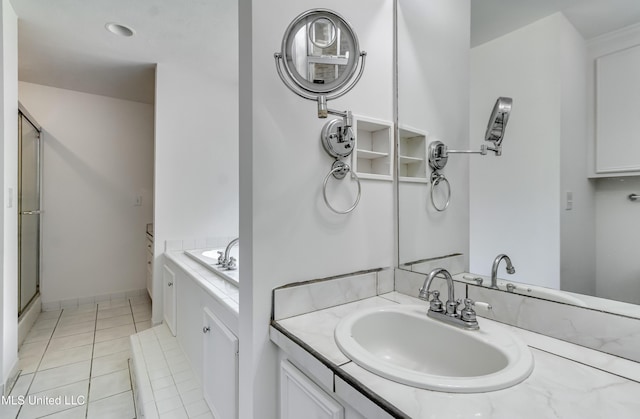 354 Lakeway Dr, Brandon, MS 39047 - bathroom with a bath, an enclosed shower, vanity, and tile patterned flooring