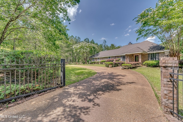 354 Lakeway Dr, Brandon, MS 39047 - ranch-style house featuring brick siding and a gate