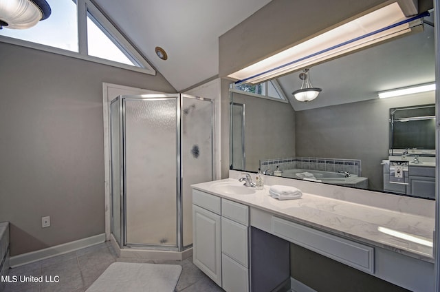 bathroom with vanity, lofted ceiling, separate shower and tub, and tile patterned flooring