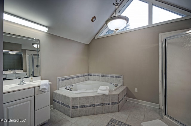 bathroom with vanity, shower with separate bathtub, vaulted ceiling, and tile patterned floors