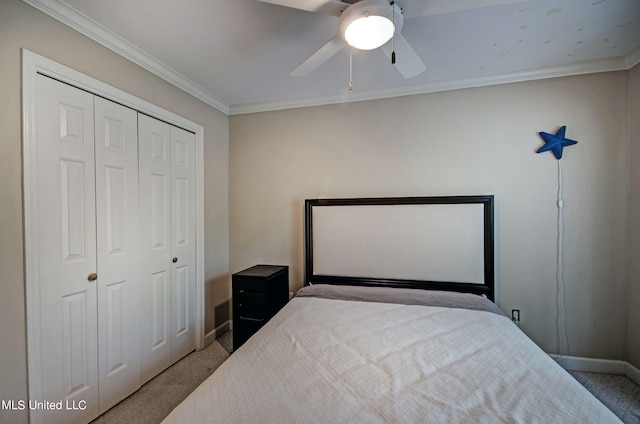 bedroom with ornamental molding, light carpet, a closet, and ceiling fan