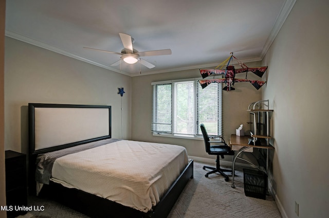 bedroom with ornamental molding, carpet, and ceiling fan