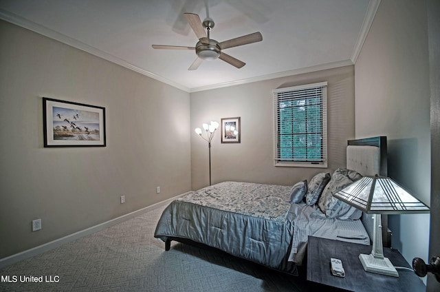 bedroom with carpet, ceiling fan, and ornamental molding