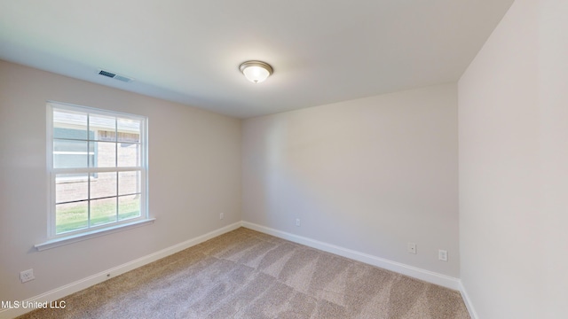 view of carpeted spare room