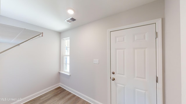 foyer entrance featuring light hardwood / wood-style flooring