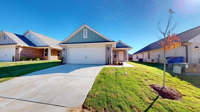 view of front of house with a garage and a front lawn