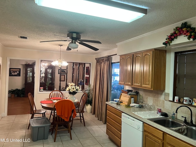 kitchen with ornamental molding, light tile patterned flooring, dishwasher, and sink