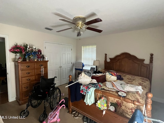 bedroom with a closet, carpet flooring, and ceiling fan