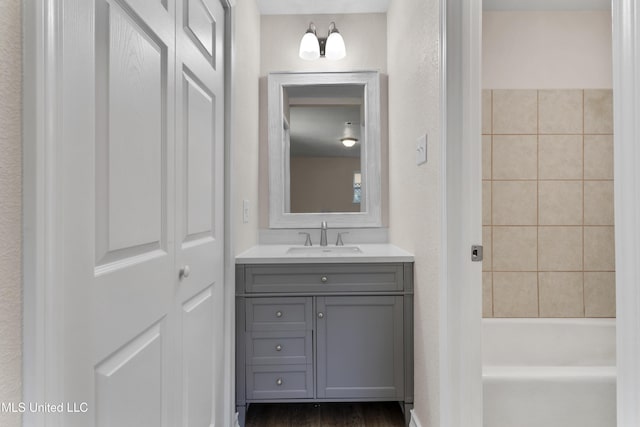 full bathroom with tub / shower combination and vanity