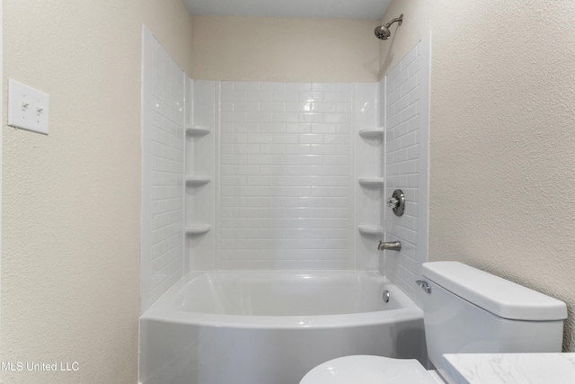 bathroom featuring a textured wall, toilet, and  shower combination