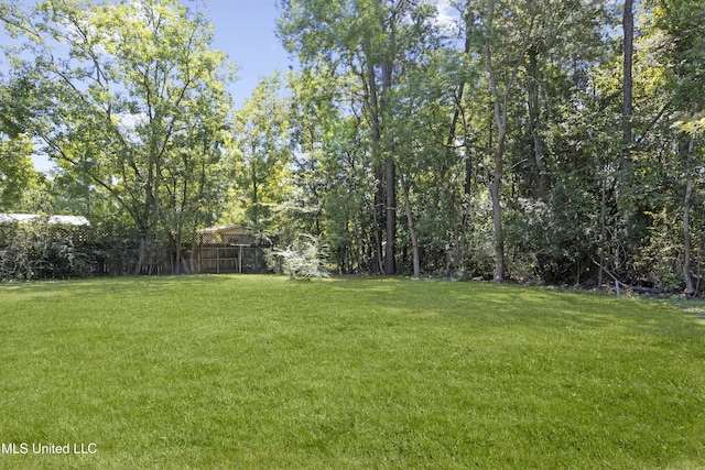 view of yard with fence